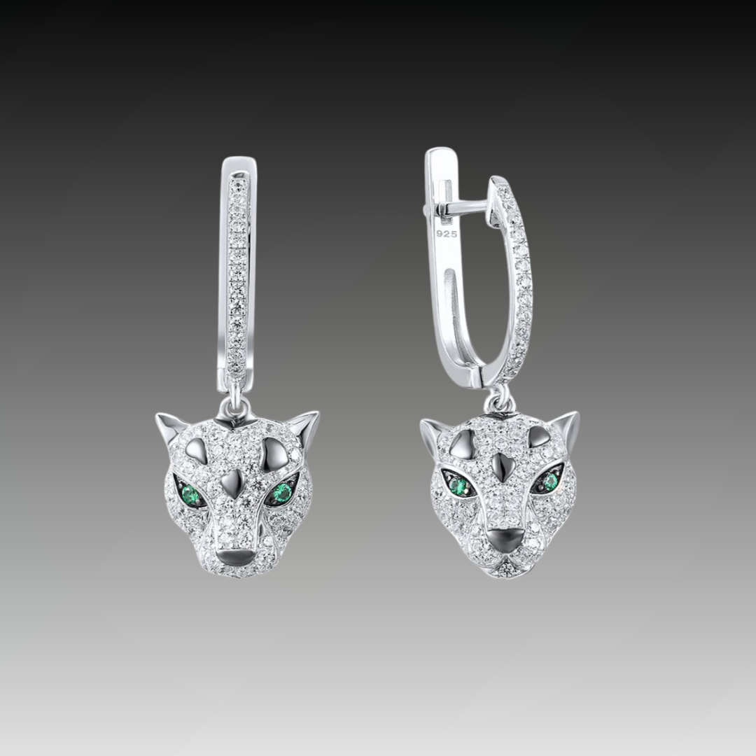 Panther head drop earrings with pavé setting and green gemstone eyes