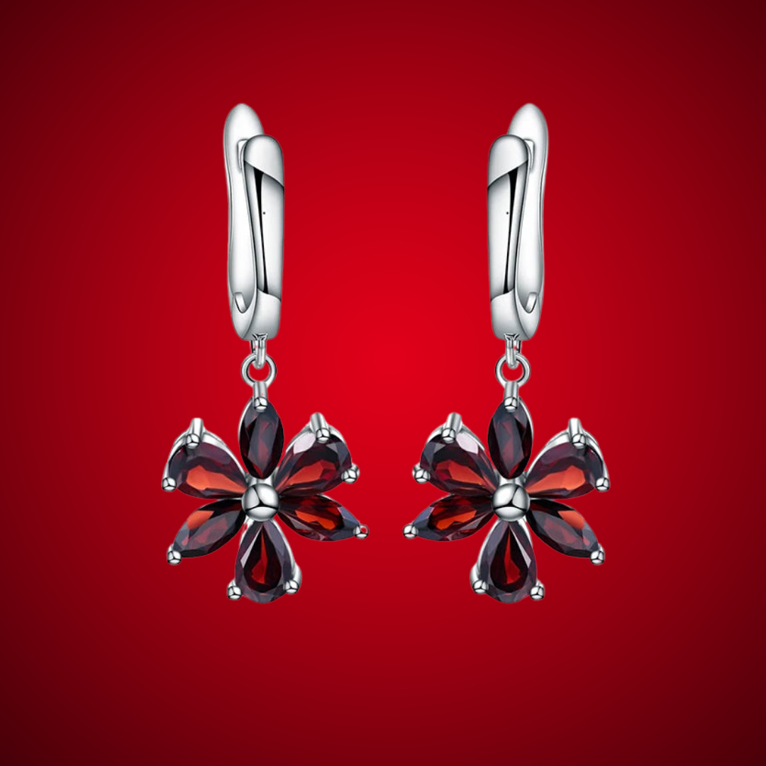 Silver floral drop earrings featuring five deep garnet-brown marquise stones arranged as petals, from the Rossa Collection.
