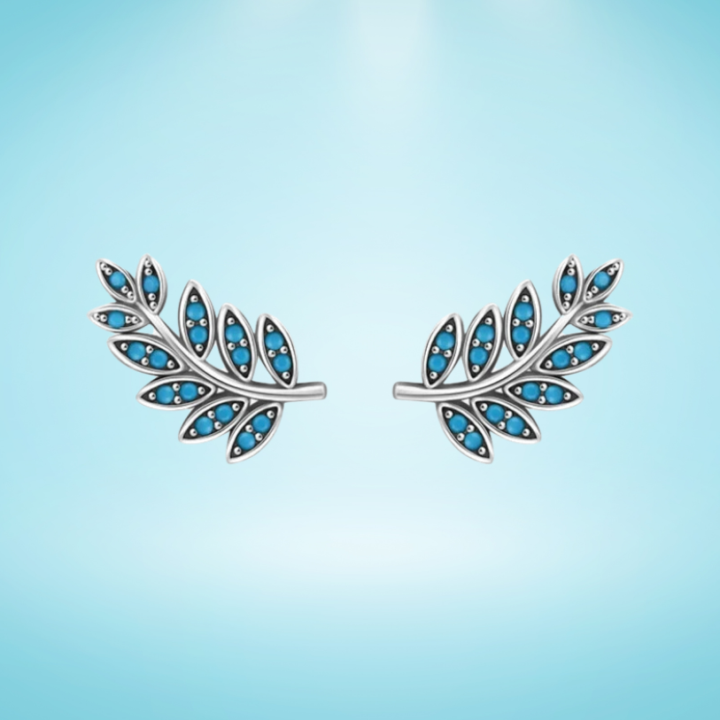 Silver feather-shaped stud earrings with vibrant turquoise enamel inlay