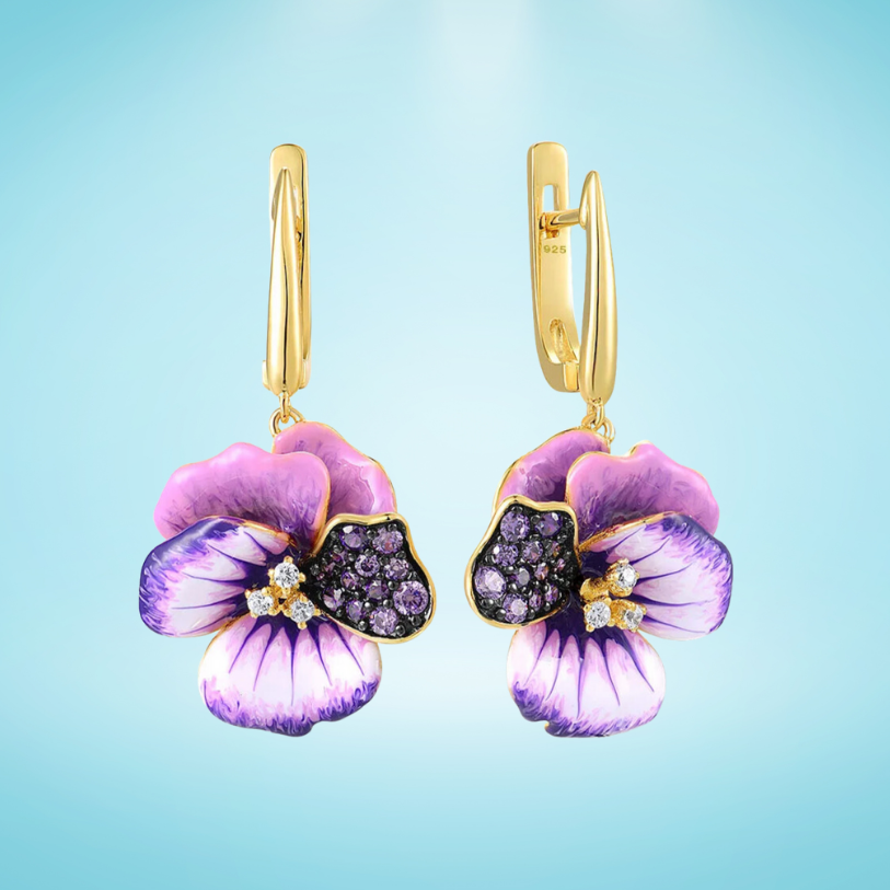 Gold-plated earrings with purple enamel pansy flowers and pavé gemstone detailing