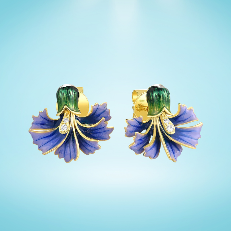 Gold-plated stud earrings with hand-painted purple and green enamel floral design and small crystal accents