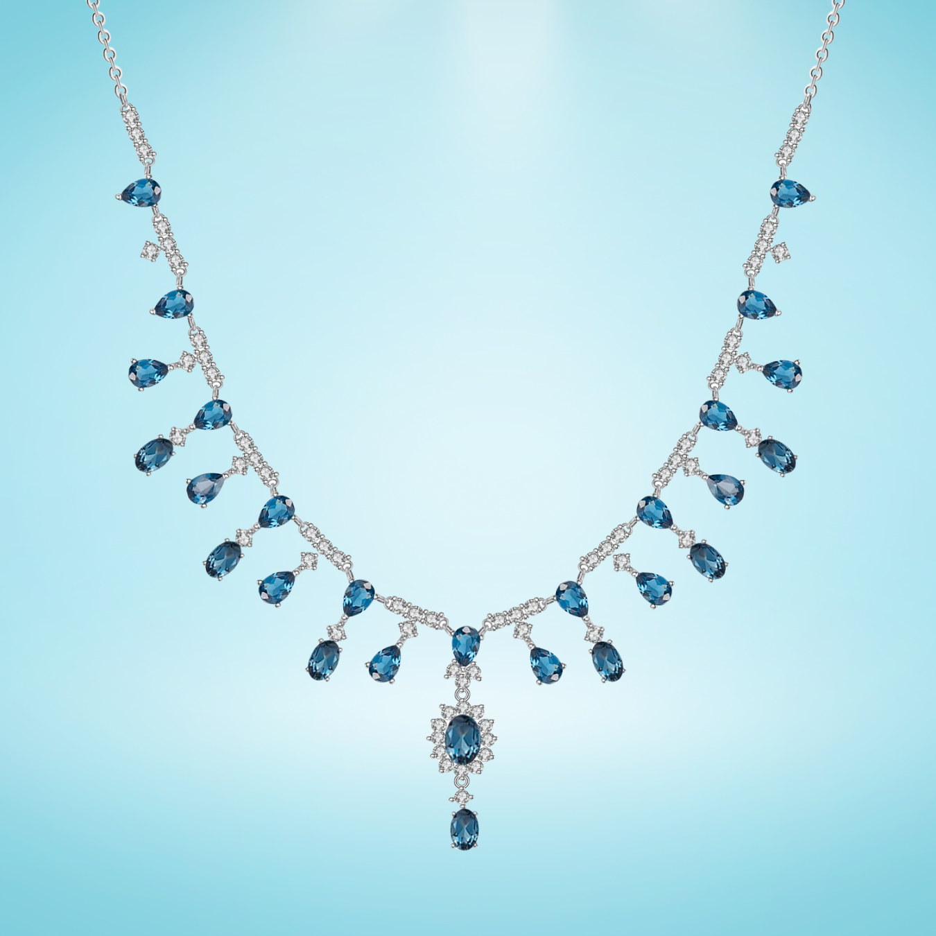 Necklace with blue gemstones on a light blue background