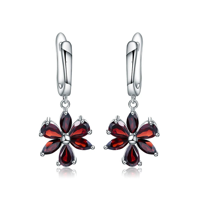Silver floral drop earrings featuring five deep garnet-brown marquise stones arranged as petals, from the Rossa Collection.
