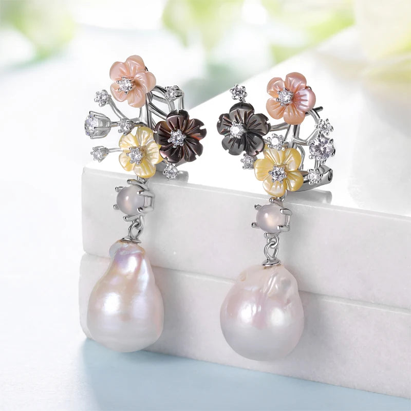 Dangling earrings with multicolour carved flowers and large baroque pearls