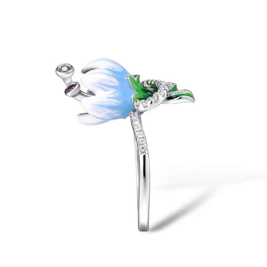 Campanula ring with hand-painted white and blue enamel flower, green leaves, and pavé detailing – Azzurro Collection