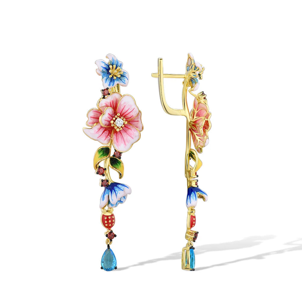 Gold-plated drop earrings with pink, blue, and red enamel flowers and teardrop blue gemstones