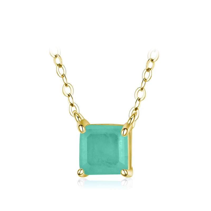 Square light green gemstone pendant on a fine gold chain.