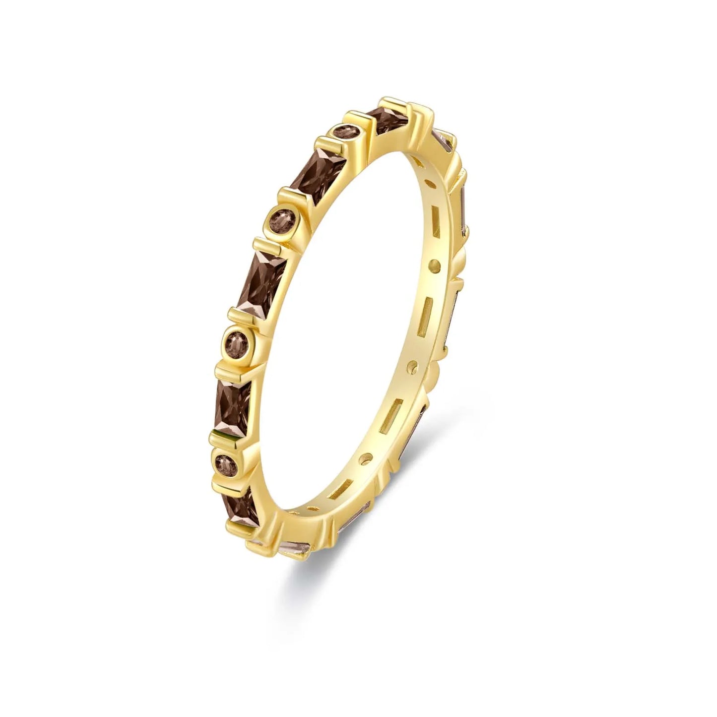 Gold ring with alternating black baguette and round stones in eternity style