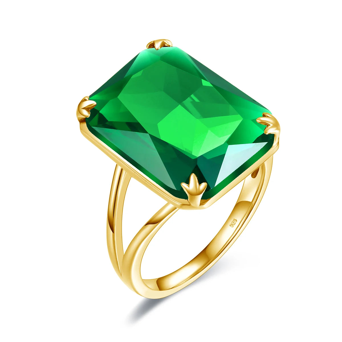 Two bold green gemstone rings with gold bands, one deep emerald green and the other a lighter peridot tone