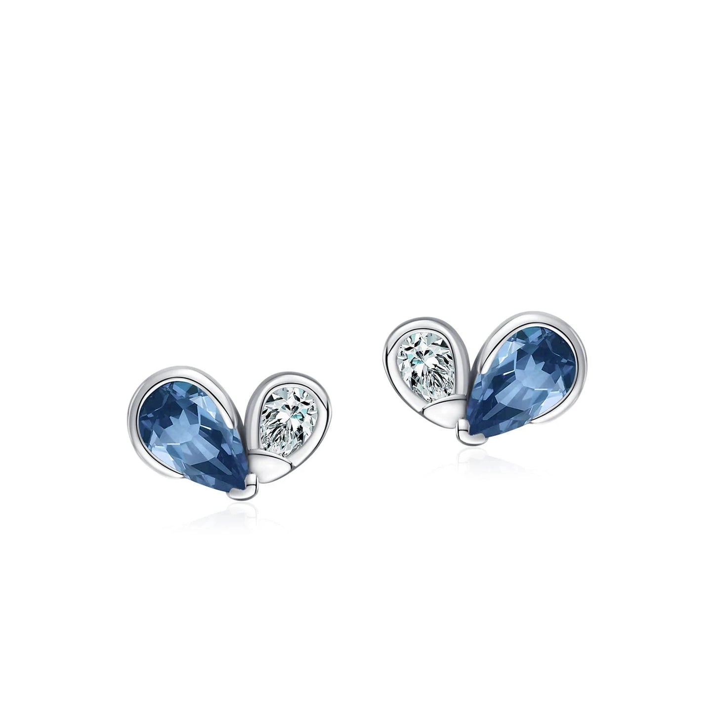Silver heart-shaped earrings with deep blue gemstones and pavé accents