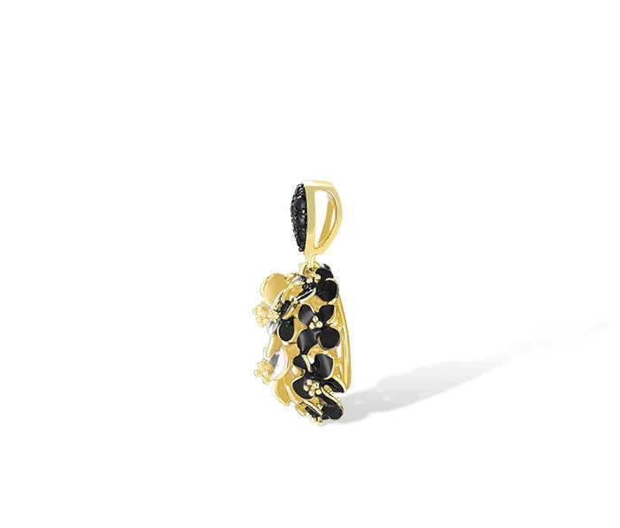 Matching jewelry set featuring black and white floral designs with gold settings, including earrings, pendant, and ring, titled Jacobaeus.