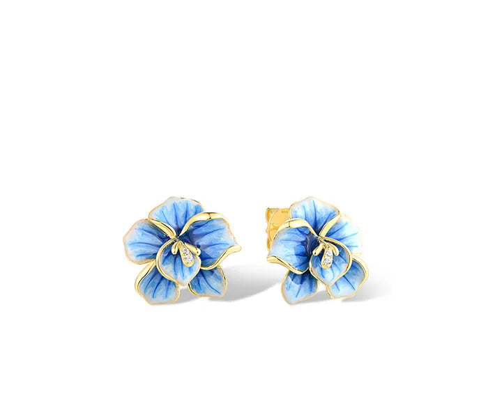 Jewelry set with hand-painted blue flower designs in gold-tone metal, featuring crystal accents