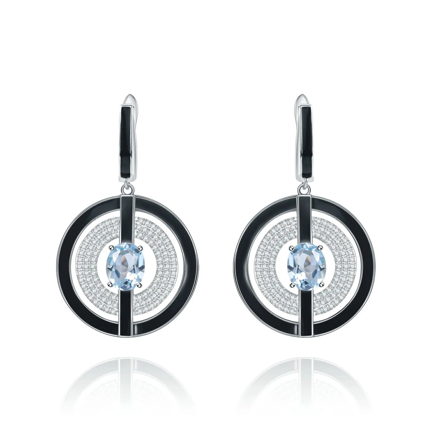 Sterling silver drop earrings with black enamel circular frames, pavé-set crystal detailing, and deep blue oval gemstones at the center