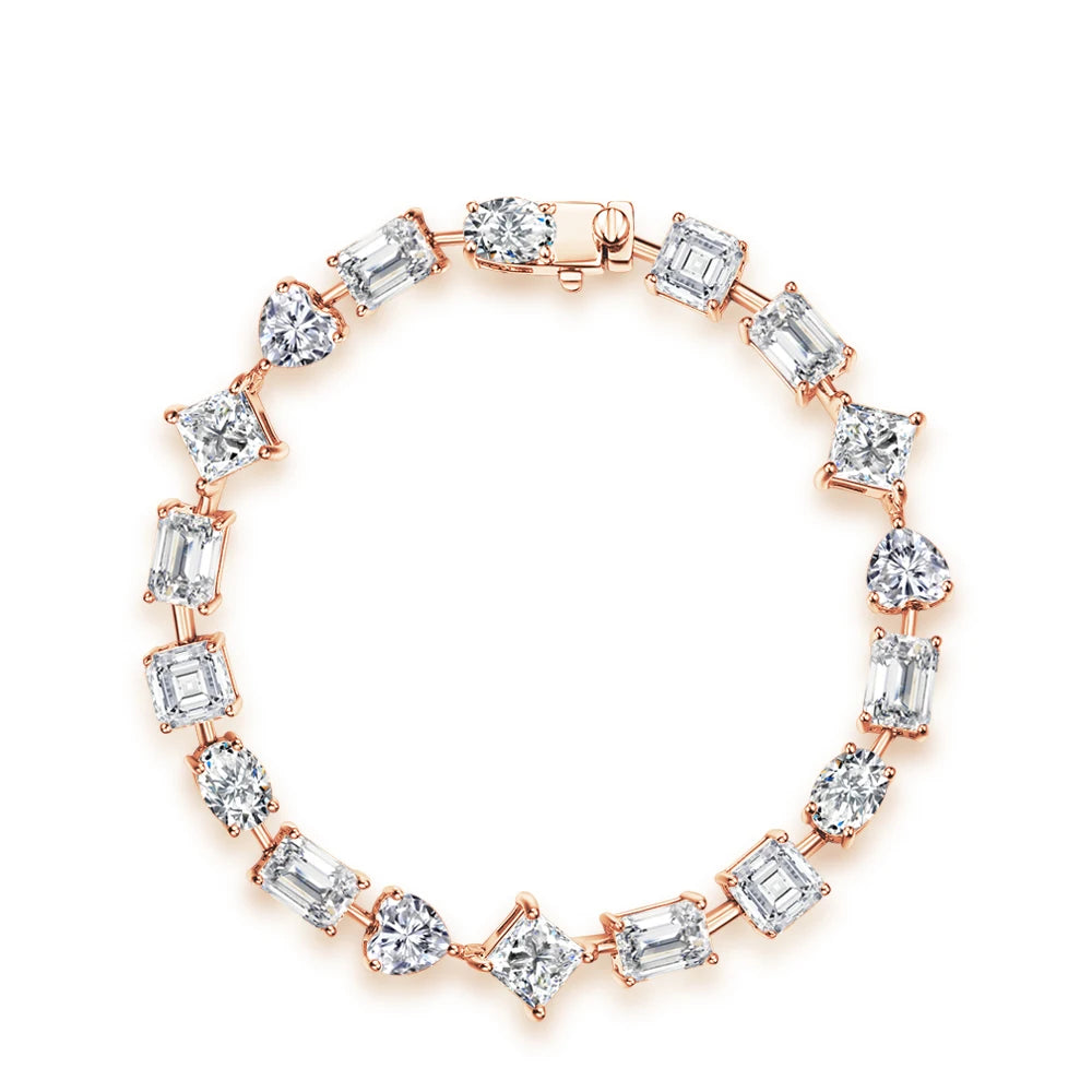 Silver bracelet with alternating geometric-cut white stones in heart, round, baguette, and princess shapes.