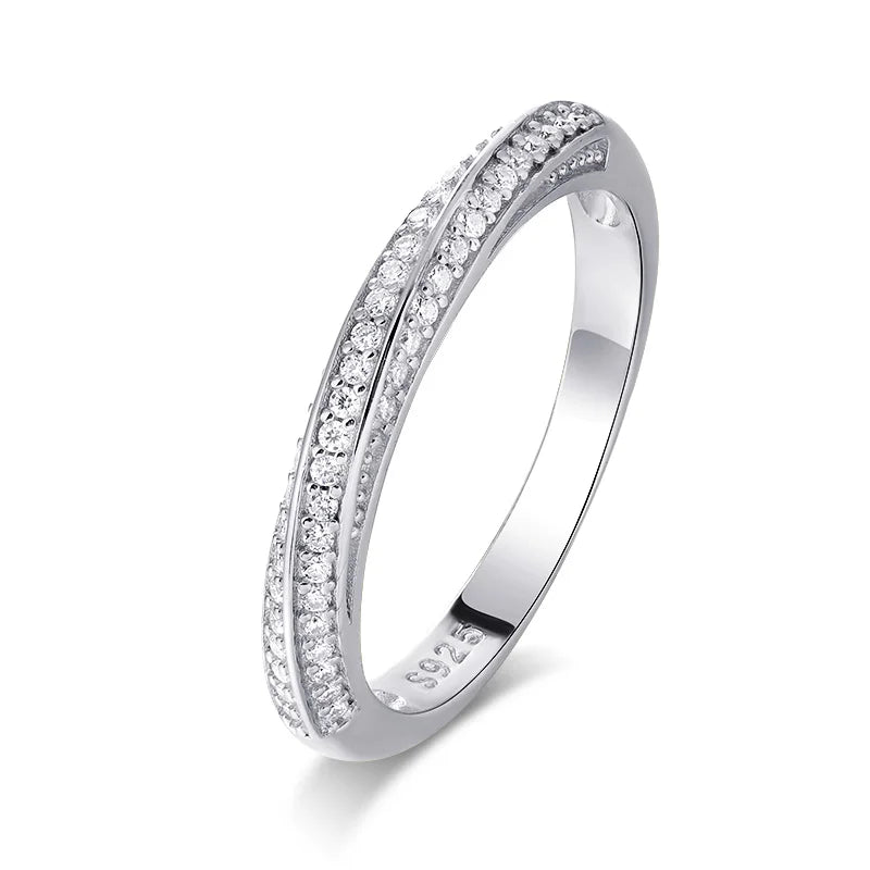 Slim silver ring featuring two parallel rows of small white stones, forming a subtle twist in the center, from the Bianco Nero collection.