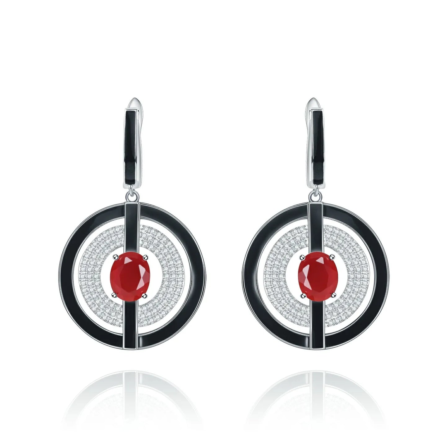 Sterling silver earrings with black enamel rings, pavé-set stones, and central red oval gems, from the Obliqua design.