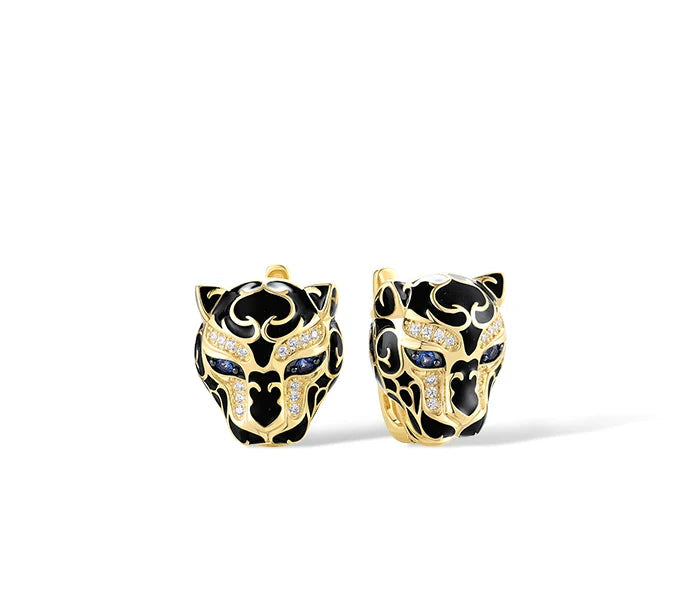 Occhi di Blu jewelry set featuring gold-tone leopard heads with sapphire blue eyes and black enamel detailing from the Bianco Nero collection.