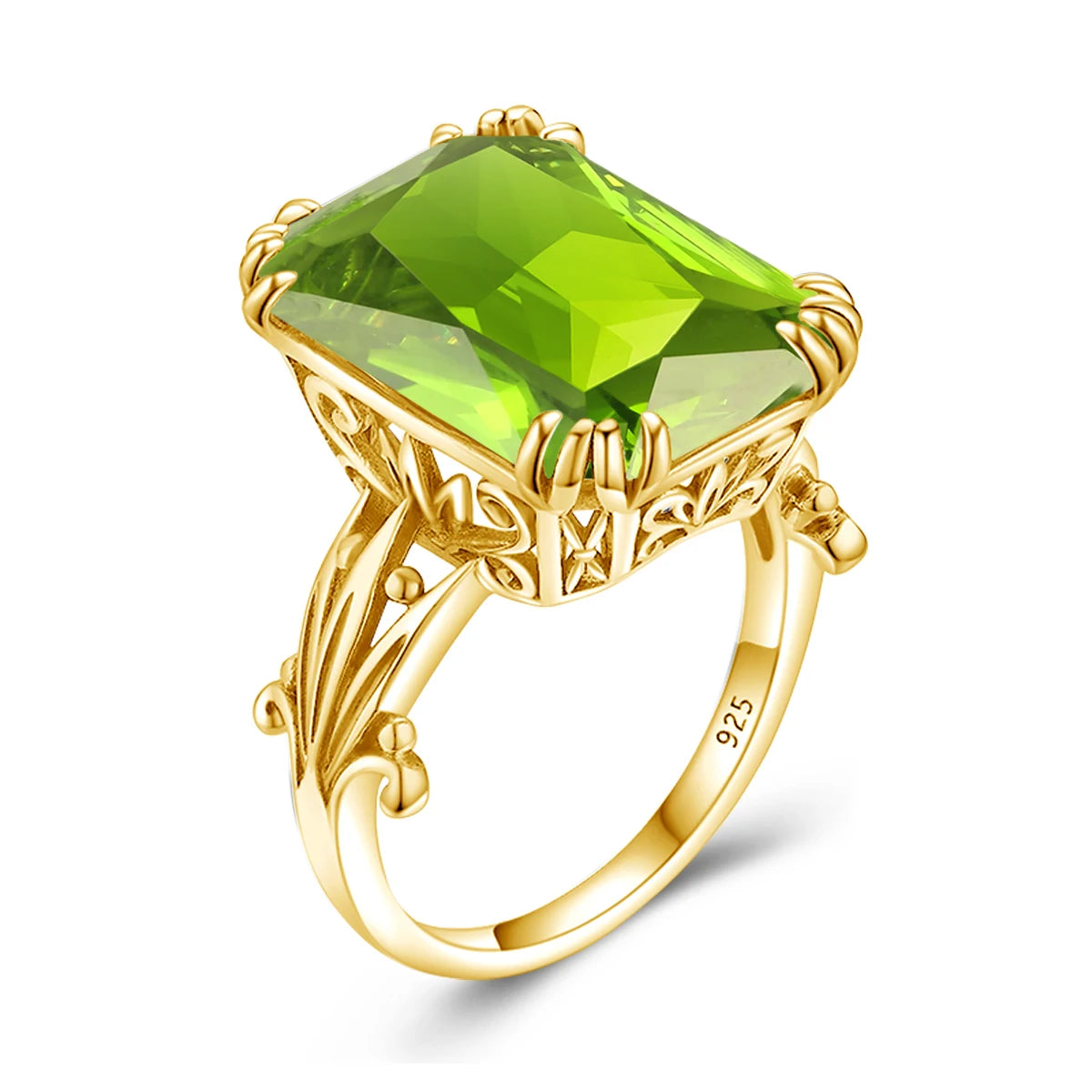Two bold green gemstone rings with gold bands, one deep emerald green and the other a lighter peridot tone