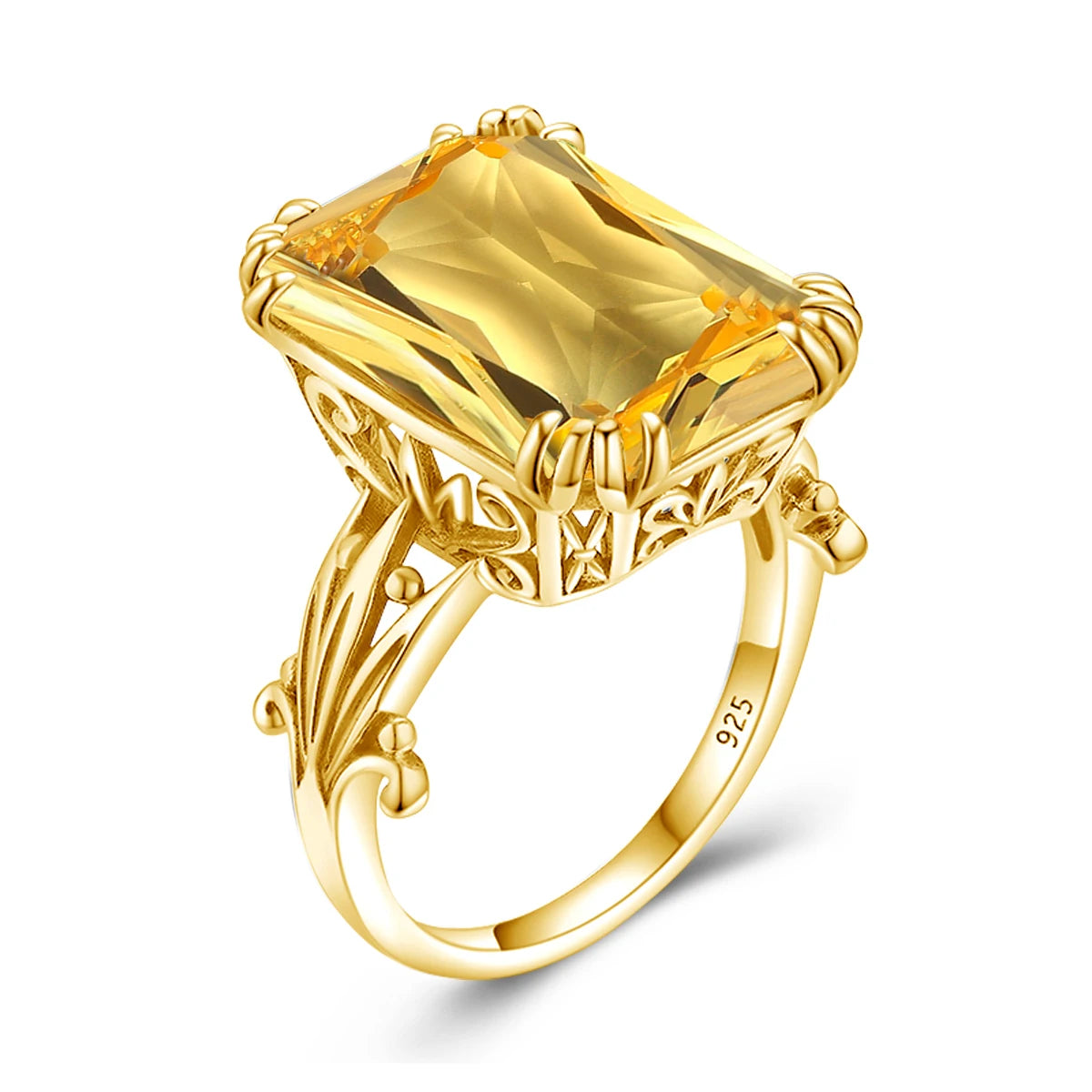 Two bold green gemstone rings with gold bands, one deep emerald green and the other a lighter peridot tone