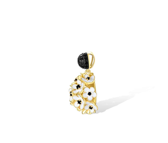 Fiore Scuro jewelry set featuring gold-tone earrings, ring, and pendant with white and black floral detailing from the Bianco Nero collection.