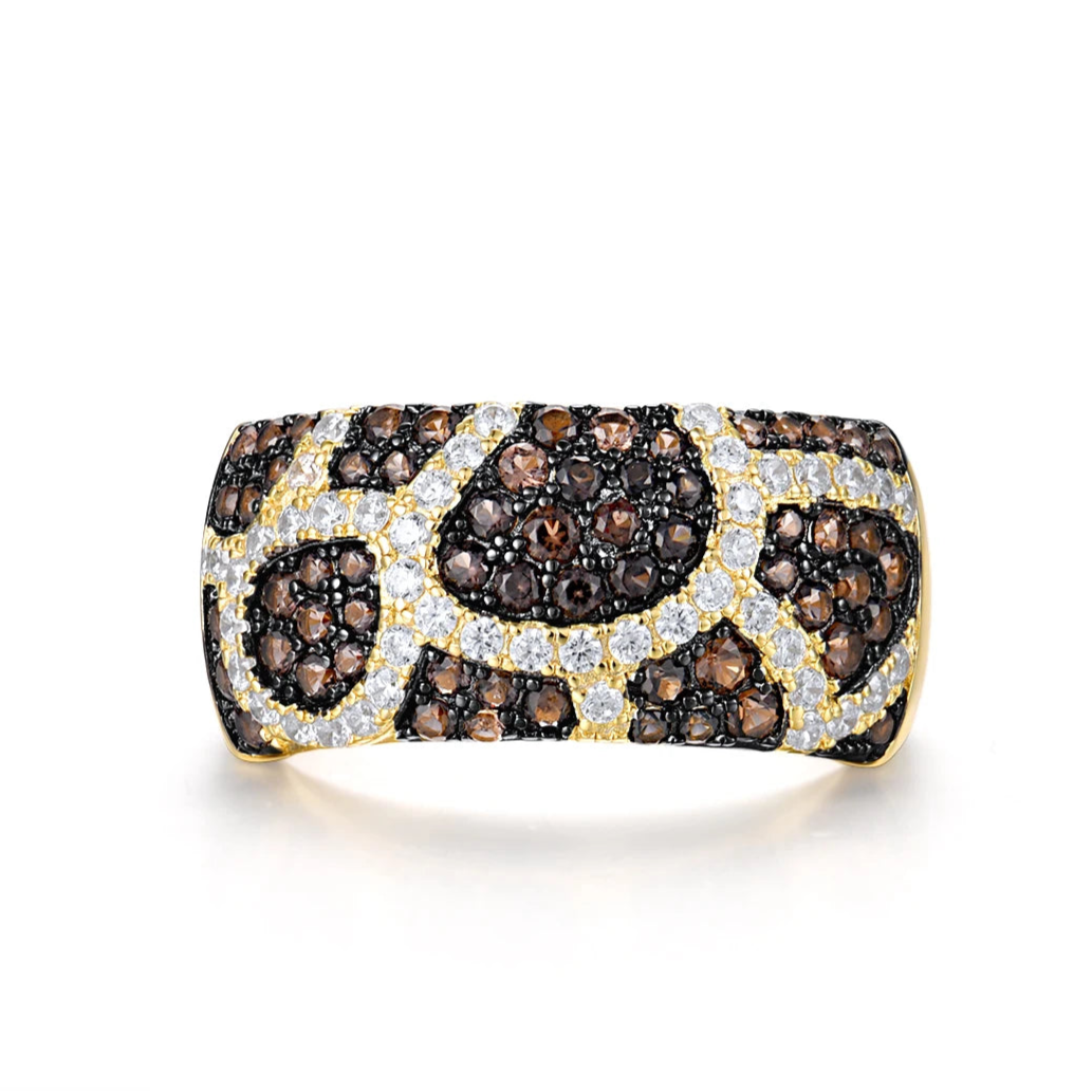 Gold ring with leopard print pattern featuring clusters of brown and white stones.