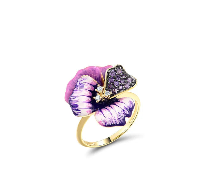 Gold jewelry set with violet enamel pansy flowers and pavé purple stones, including earrings, pendant, and matching ring