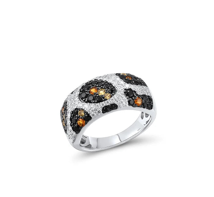 Matching jewelry set with leopard-inspired design in silver and gemstone accents, including ring and earrings, titled Pardus Lux.