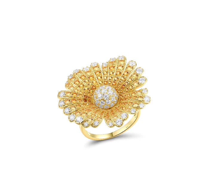 Gold-toned jewelry set with large daisy-like floral designs fully encrusted with clear crystals