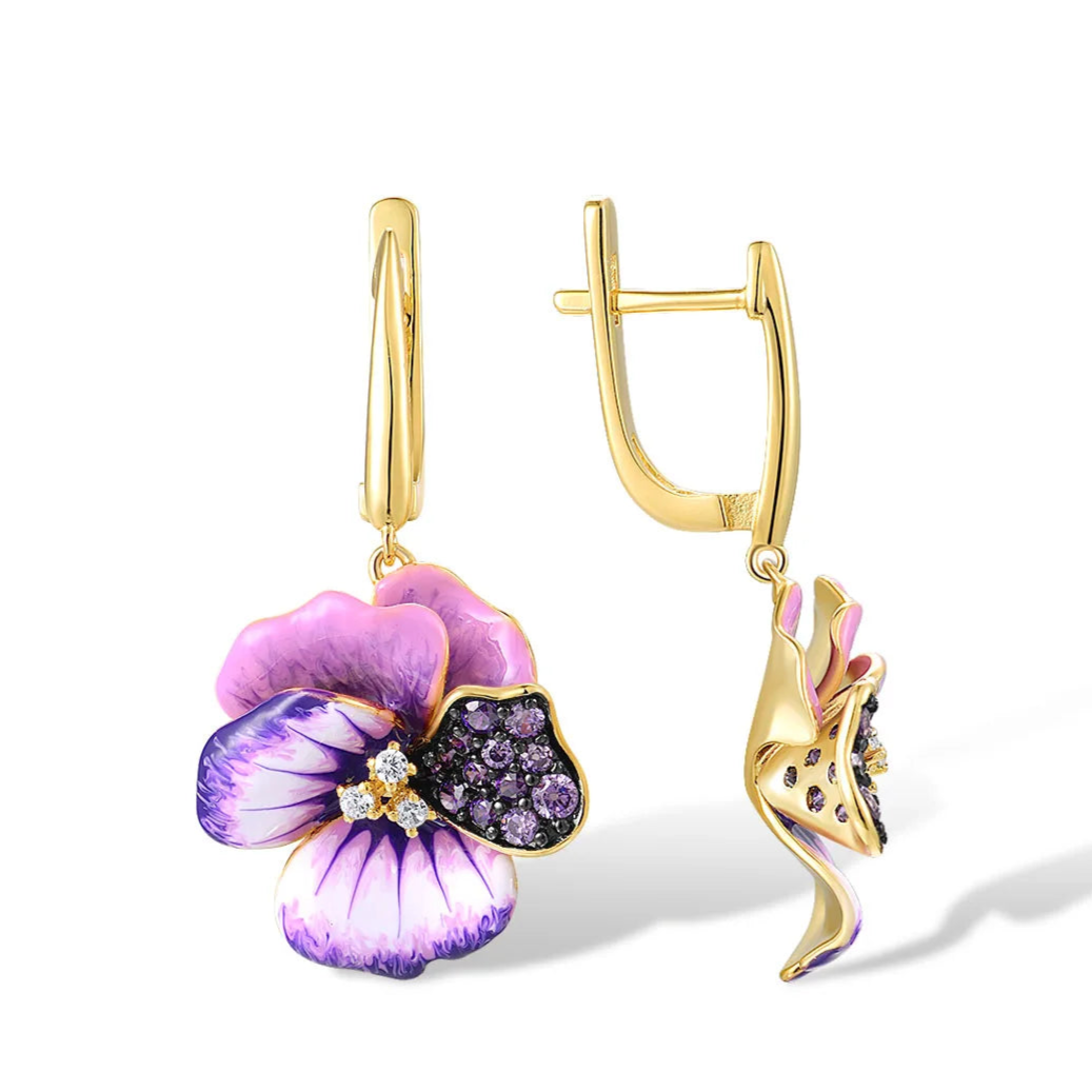 Gold-plated earrings with purple enamel pansy flowers and pavé gemstone detailing