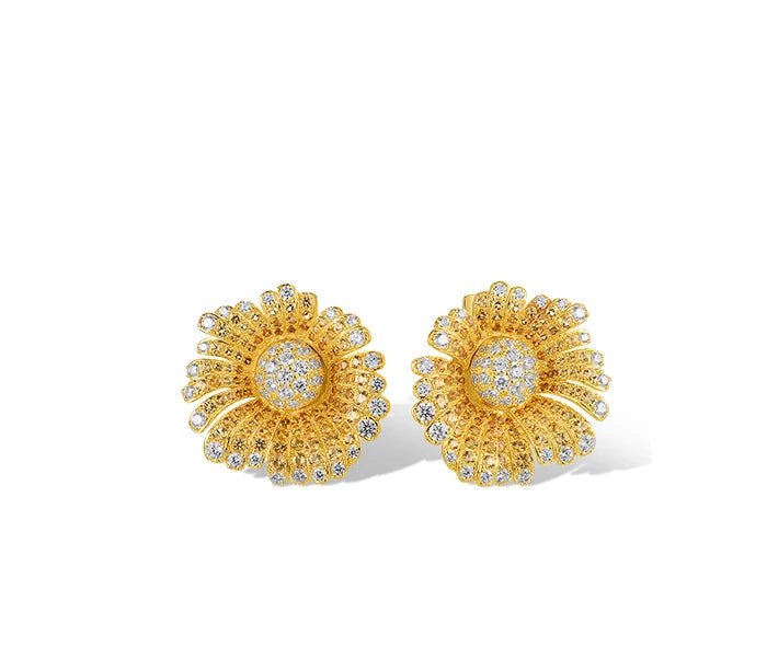 Gold-toned jewelry set with large daisy-like floral designs fully encrusted with clear crystals