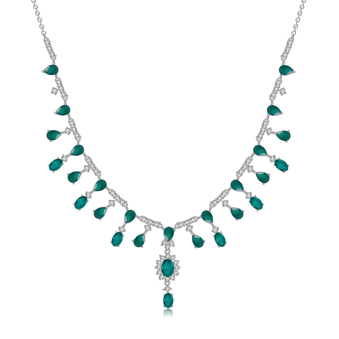A silver necklace featuring green garnet stones set in an oval pattern with additional small white stones on a link chain.