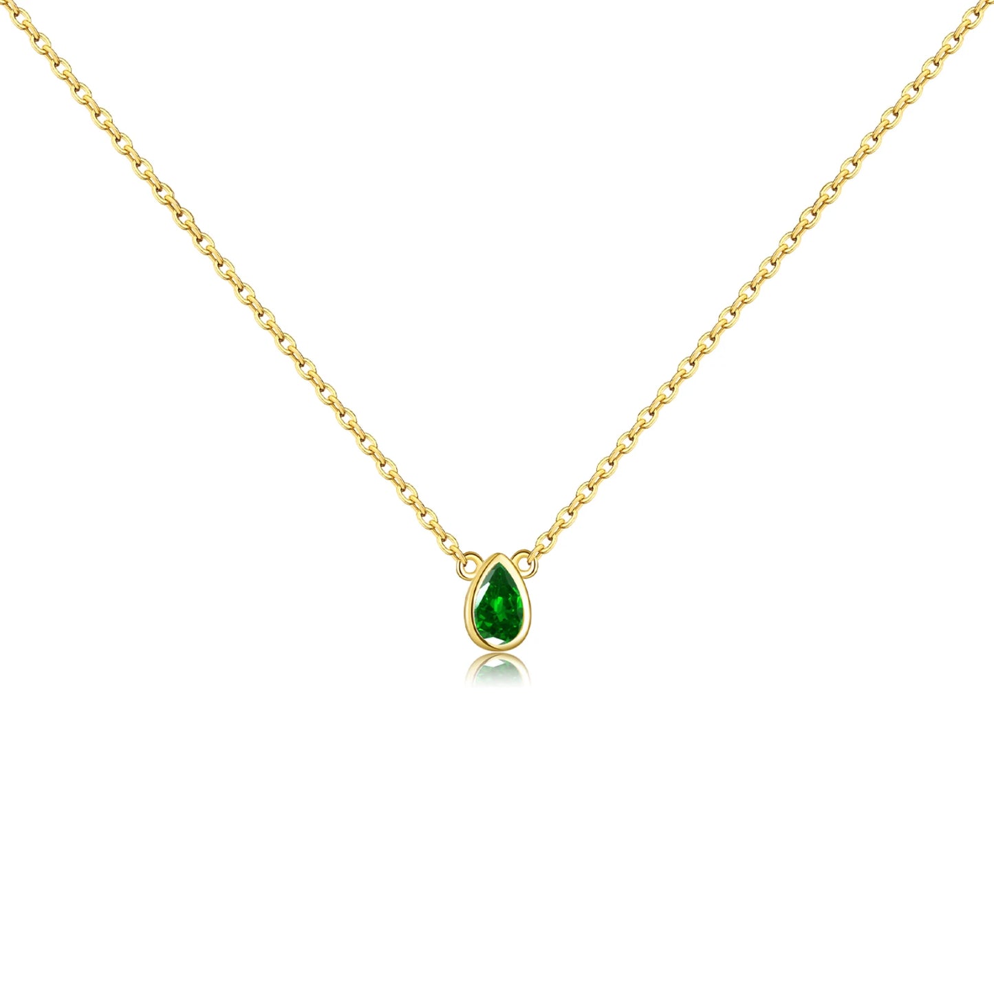 Delicate gold necklace featuring a teardrop-shaped green gemstone pendant.