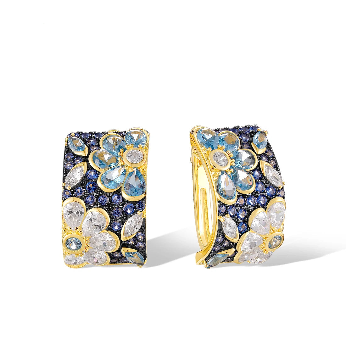 Gold-plated hoop earrings with floral gemstone clusters in blue and white on a dark pavé background
