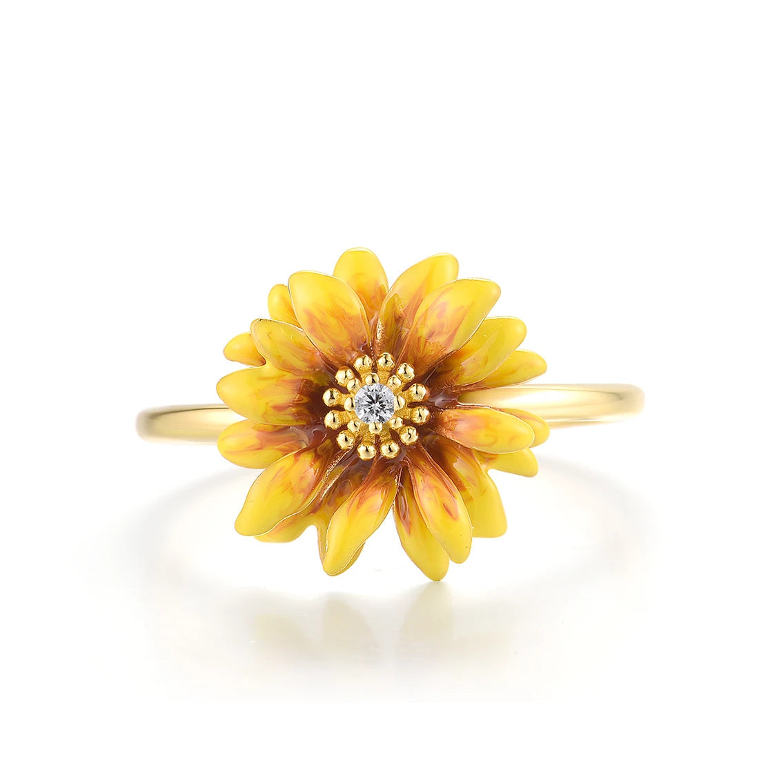 Yellow enamel flower ring with warm tones and central crystal accent