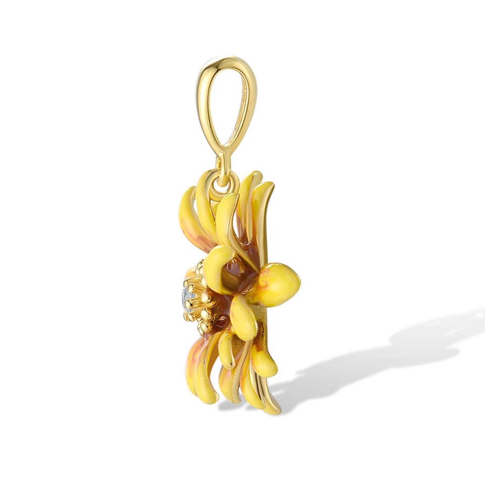 Yellow and brown enamel flower pendant with central crystal accent