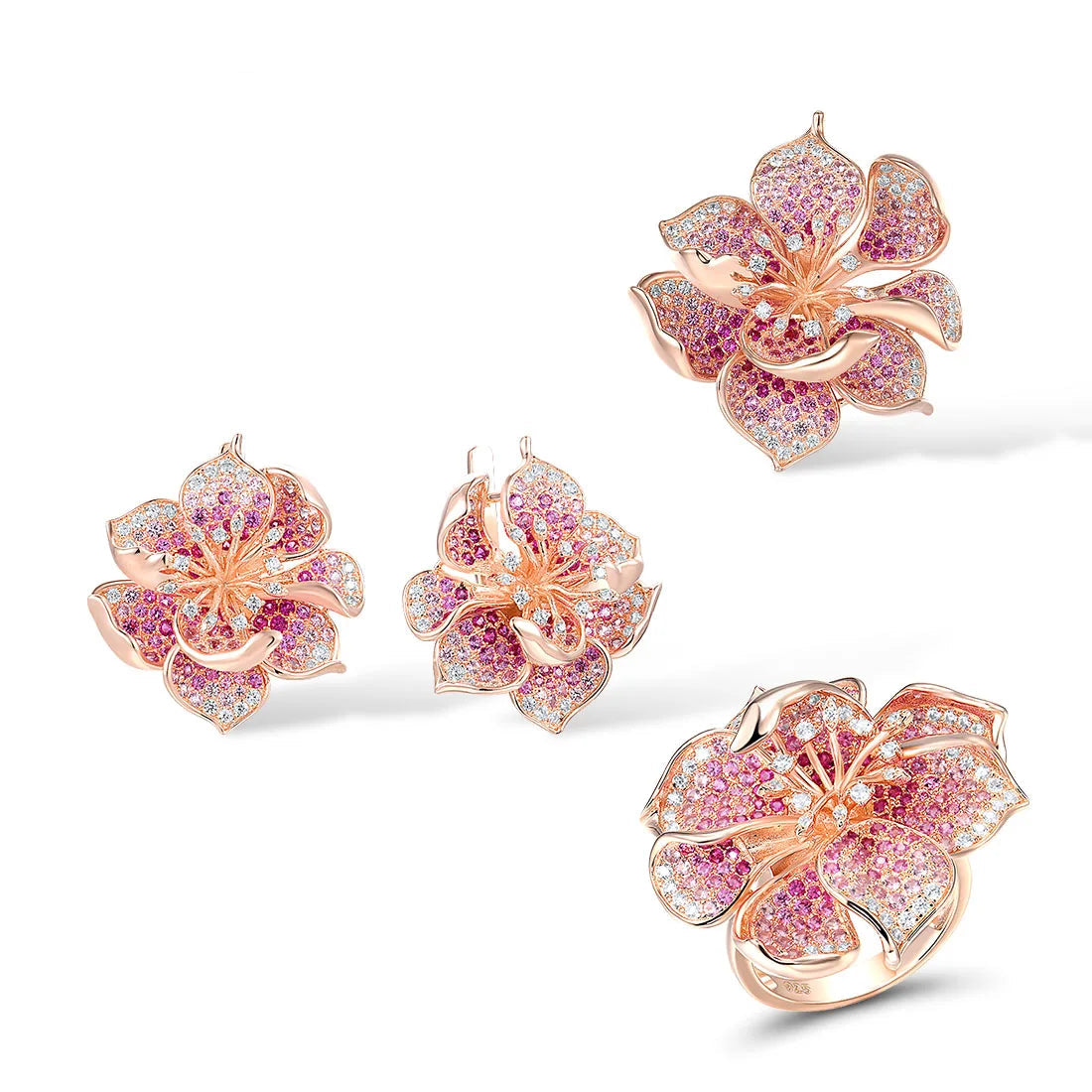 Fragola jewelry set featuring pink and violet pavé stones in rose gold flower designs including ring, earrings, and pendant.