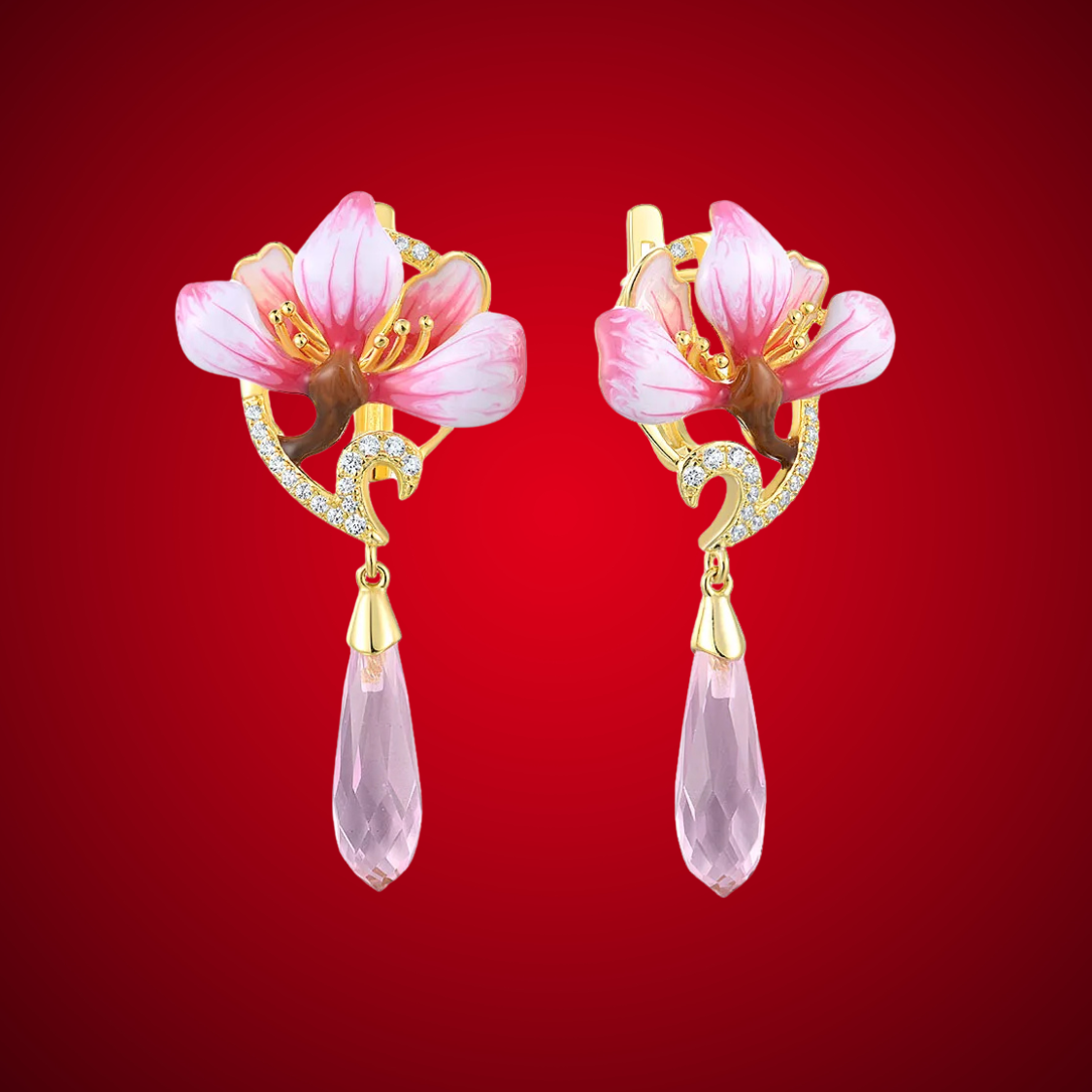 Lampadario earrings with pink enamel flower tops, gold detailing, and faceted pink teardrop dangles.