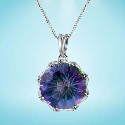 Silver pendant with a round multicoloured quartz stone in a scalloped prong setting

