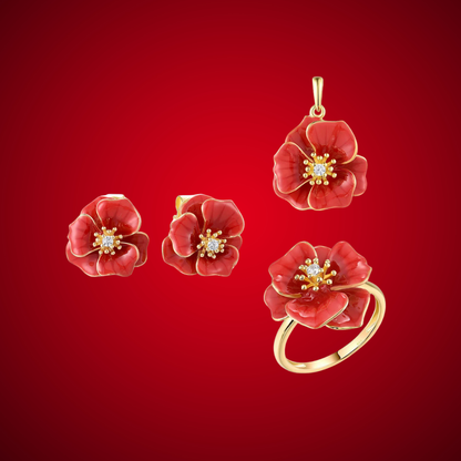 Jewelry set from the Rossa Collection featuring red enamel flower-shaped earrings, pendant, and ring with gold-tone detailing and central white stones.

