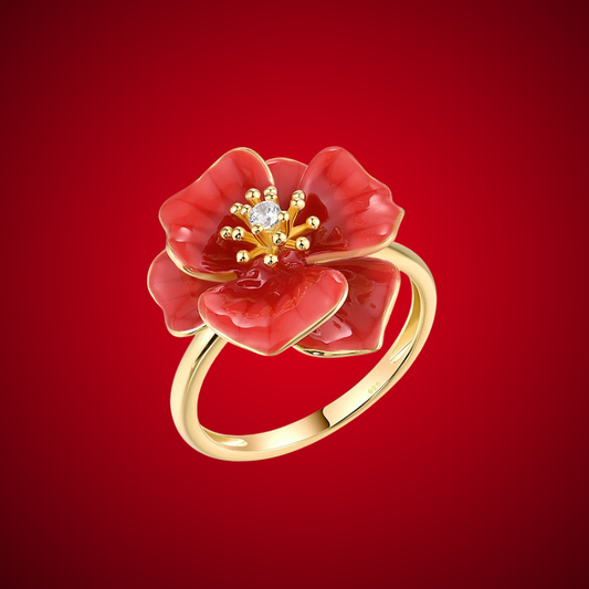 Gold ring featuring a red enamel rose with a white central stone, Rosa Rossa from the Rossa Collection.

