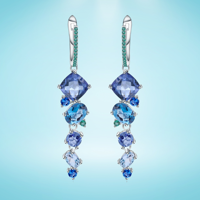 Dangling earrings with gradient blue and green stones set in silver

