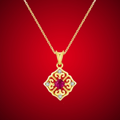 Gold-plated necklace with a ruby-red square stone and ornate vintage design

