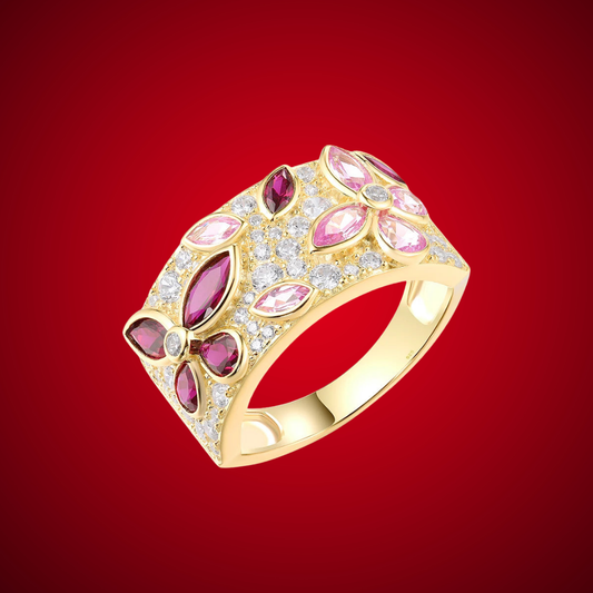 Gold ring set with marquise-cut pink and red stones forming floral patterns, Rosea from the Rossa Collection.

