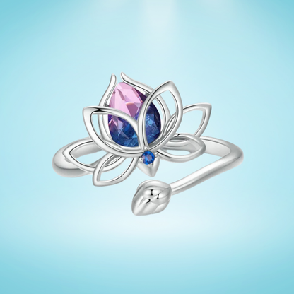 Sterling silver lotus flower ring with pink and blue gradient gemstone and small blue accent stone

