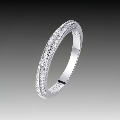 Slim silver ring featuring two parallel rows of small white stones, forming a subtle twist in the center, from the Bianco Nero collection.

