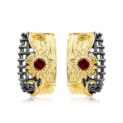 Coordinated necklace, earrings, and ring set with gold sunflower design and purple gemstones


