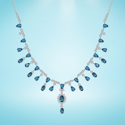 Necklace with blue gemstones on a light blue background