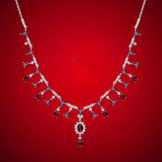 Elegant necklace with red gemstones and diamonds on a red background