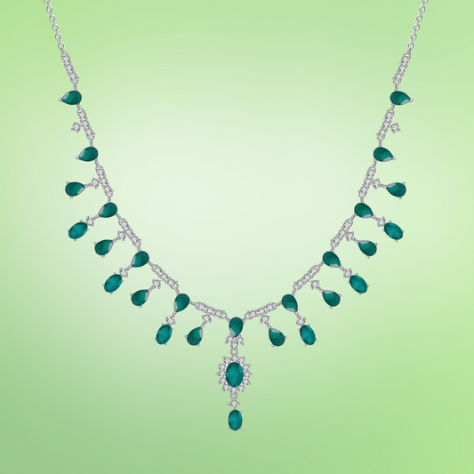 Emerald necklace on a light green background