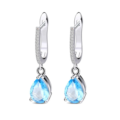 Set of three sterling silver drop earrings with pear-shaped stones in blue, navy, and violet, accented with pavé-set crystals